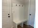 Functional mudroom area with a built-in bench, coat hooks, and convenient storage solutions at 4808 Glen Stripe Dr # Cal0036, Indian Trail, NC 28079