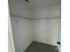 Walk-in closet featuring ample shelving for storage at 4808 Glen Stripe Dr # Cal0036, Indian Trail, NC 28079