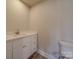 Simple bathroom with vanity, toilet and flooring at 1133 Heather Oak Ln, Oakboro, NC 28129