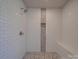 Large walk-in shower with hexagon tile accents at 1133 Heather Oak Ln, Oakboro, NC 28129