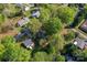 A captivating aerial view of a neighborhood, showcasing lush greenery and residential homes at 209 21St St, Newton, NC 28658