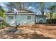 Backyard features a basketball hoop, outdoor seating, grill, and a fire pit at 209 21St St, Newton, NC 28658