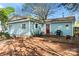 Backyard features an outdoor dining set, barbecue grill, and a fire pit on a stone patio at 209 21St St, Newton, NC 28658