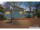 Backyard features a basketball hoop, outdoor seating, grill, and a fire pit at 209 21St St, Newton, NC 28658