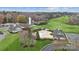 Aerial view of community pool, clubhouse, and grounds at 330 Muirfield Way # 63, Salisbury, NC 28144