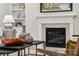 Modern fireplace with a marble surround and built-in shelving at 330 Muirfield Way, Salisbury, NC 28144