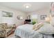 Well lit bedroom featuring a bed and a work space at 1007 Ashford St, Charlotte, NC 28214