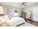 Relaxing bedroom showcasing ample natural light, hardwood floors, and comfortable furnishings at 1007 Ashford St, Charlotte, NC 28214