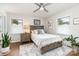 Serene bedroom with hardwood floors, natural light, and a comfortable bed at 1007 Ashford St, Charlotte, NC 28214