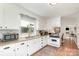 Bright kitchen featuring granite countertops, white cabinets, and stainless steel appliances at 1007 Ashford St, Charlotte, NC 28214