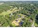 Expansive aerial view of the property, surrounded by lush trees and well-maintained neighborhood at 8932 Myra Way, Charlotte, NC 28215