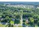 Aerial view of the neighborhood with lush greenery and manicured lawns at 8932 Myra Way, Charlotte, NC 28215