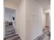 Hallway featuring wood-look floors and doors to bedrooms and a bathroom at 8932 Myra Way, Charlotte, NC 28215