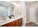 Bright bathroom features double sink vanity, large mirror, and white doors at 423 Old Dutch Rd, Indian Trail, NC 28079