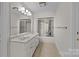 Bathroom with double vanity and shower/tub combo at 721 Orphanage Rd, Concord, NC 28027