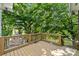 Elevated wooden deck provides scenic wooded views at 721 Orphanage Rd, Concord, NC 28027