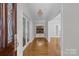 Bright entryway with hardwood floors and views into the living room at 721 Orphanage Rd, Concord, NC 28027