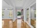 Inviting front door entrance with hardwood floors and natural light at 721 Orphanage Rd, Concord, NC 28027