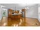 Island kitchen with stainless steel appliances and hardwood floors at 721 Orphanage Rd, Concord, NC 28027