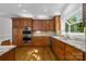 Kitchen with stainless steel appliances and granite countertops at 721 Orphanage Rd, Concord, NC 28027