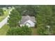 Aerial view showcasing the home's backyard and surrounding trees at 902 Snow Prince Ln, York, SC 29745