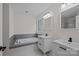 Modern bathroom with double vanity, soaking tub, and window at 902 Snow Prince Ln, York, SC 29745