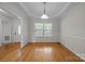 Bright dining room with hardwood floors and crown molding at 902 Snow Prince Ln, York, SC 29745