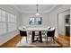 Elegant dining room with hardwood floors and modern light fixture at 902 Snow Prince Ln, York, SC 29745