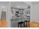 Modern kitchen with gray cabinets and granite countertops at 902 Snow Prince Ln, York, SC 29745