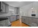 Modern kitchen featuring gray cabinets and granite countertops at 902 Snow Prince Ln, York, SC 29745