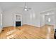 Bright living room with hardwood floors and a fireplace at 902 Snow Prince Ln, York, SC 29745