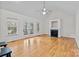 Spacious living room featuring hardwood floors, fireplace, and vaulted ceiling at 902 Snow Prince Ln, York, SC 29745