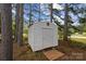 White storage shed with wooden access ramp at 902 Snow Prince Ln, York, SC 29745