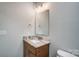 Small bathroom with granite vanity and single sink at 1517 28Th Street Se Pl, Hickory, NC 28602