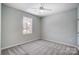 Charming bedroom with gray carpeting and a window at 1517 28Th Street Se Pl, Hickory, NC 28602