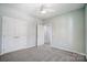 Spacious bedroom with double doors and carpet at 1517 28Th Street Se Pl, Hickory, NC 28602