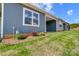 Home exterior showcasing a patio and landscaping at 1517 28Th Street Se Pl, Hickory, NC 28602