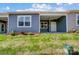 Home exterior showcasing a patio and landscaping at 1517 28Th Street Se Pl, Hickory, NC 28602