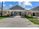 Gray exterior of house with covered carport and brick accents at 1517 28Th Street Se Pl, Hickory, NC 28602