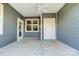 Covered patio with concrete flooring and ceiling fan at 1517 28Th Street Se Pl, Hickory, NC 28602