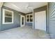 Covered patio with concrete flooring and ceiling fan at 1517 28Th Street Se Pl, Hickory, NC 28602