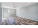 Spacious bedroom with light walls and wood-look flooring at 1523 28Th Street Se Pl, Hickory, NC 28602