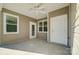 Covered patio with ceiling fan and double French doors at 1523 28Th Street Se Pl, Hickory, NC 28602