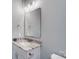 Modern bathroom with a white vanity and granite countertop at 1529 28Th Street Se Pl, Hickory, NC 28602