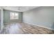 Spacious bedroom with wood-look floors and neutral walls at 1529 28Th Street Se Pl, Hickory, NC 28602