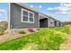 Exterior view of townhouses with gray siding and grassy yards at 1529 28Th Street Se Pl, Hickory, NC 28602