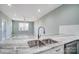 Modern kitchen with double sink and granite countertops at 1529 28Th Street Se Pl, Hickory, NC 28602