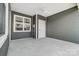 Covered patio with ceiling fan and exterior door at 1529 28Th Street Se Pl, Hickory, NC 28602