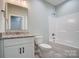 Bathroom with single vanity and bathtub at 2866 15Th Avenue Se Pl, Hickory, NC 28602