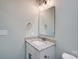 Small bathroom with single vanity and granite countertop at 2866 15Th Avenue Se Pl, Hickory, NC 28602